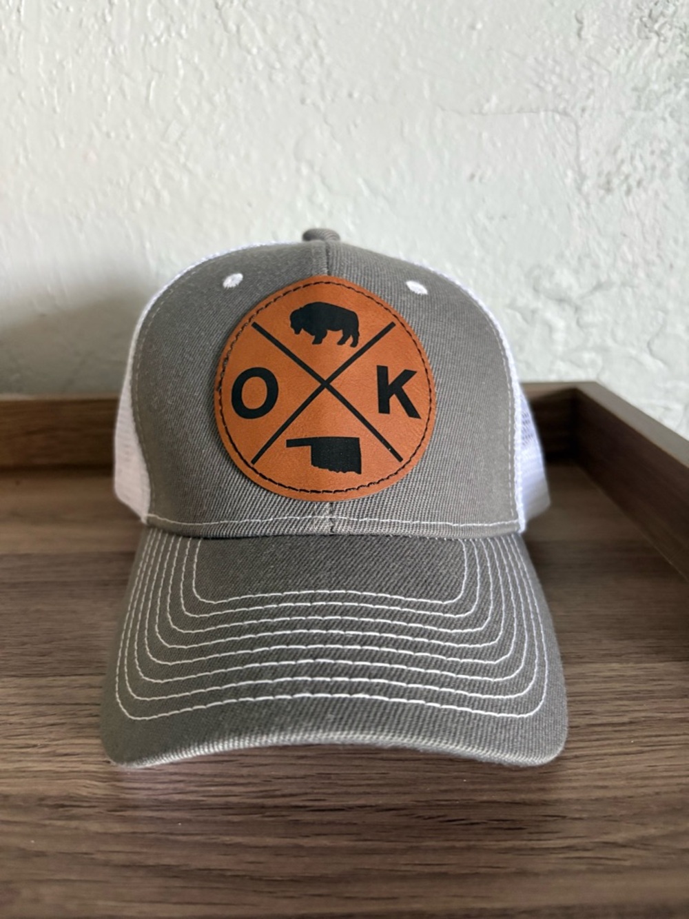 Gray and White Trucker Hat with Leather OK Patch